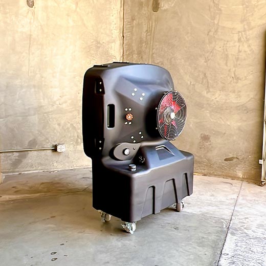 small portable evaporative cooler product in a cement room